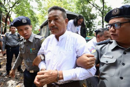 Kyi Lin, who is accused of killing Ko Ni, arrives at Insein court in Yangon, Myanmar, September 20, 2018. REUTERS/Ann Wang/Files