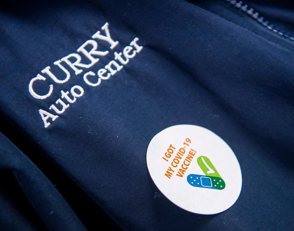 Stickers are available to those who go through the process at the COVID-19 vaccination clinic at the Monroe Convention Center. (Rich Janzaruk / Herald-Times)