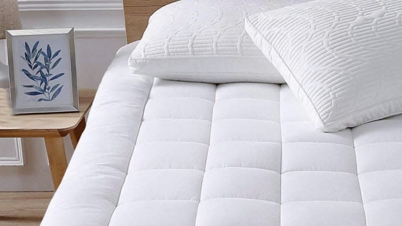 Mattress pads should be used to keep mattresses clean, but some come with cooling features to help you sleep on summer nights.