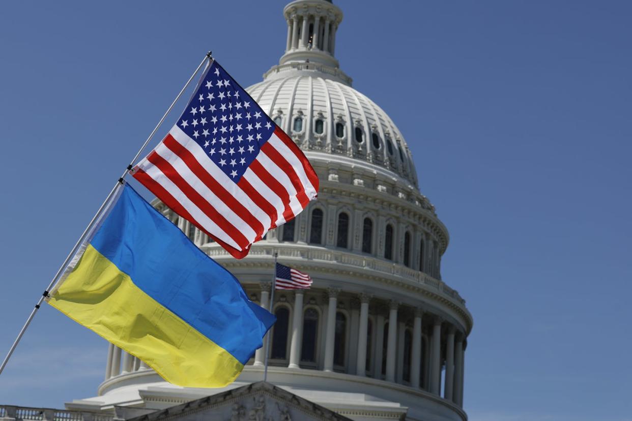 Flags for the United States and Ukraine billow outside of the Capitol building on April 23, 2024. <a href="https://www.gettyimages.com/detail/news-photo/flags-for-the-united-states-and-ukraine-billow-in-the-wind-news-photo/2149863050?adppopup=true" rel="nofollow noopener" target="_blank" data-ylk="slk:Anna Moneymaker/Getty Images;elm:context_link;itc:0;sec:content-canvas" class="link ">Anna Moneymaker/Getty Images</a>