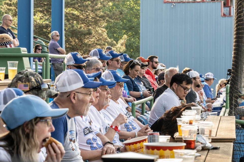 Fans enjoy some food and beverages during the Battle Creek Battle Jacks opening night at C.O. Brown Stadium on Monday, May 30, 2022