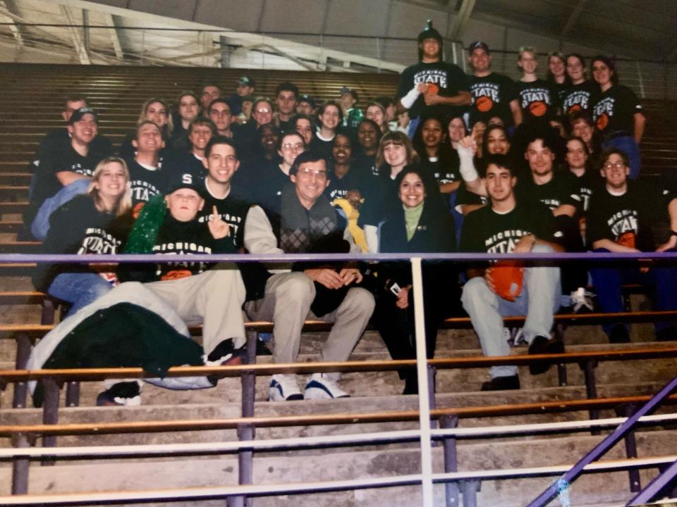 Izzone members posing for a photo with Lupe Izzo during a MSU basketball road trip to Northwestern University in the mid-1990s.