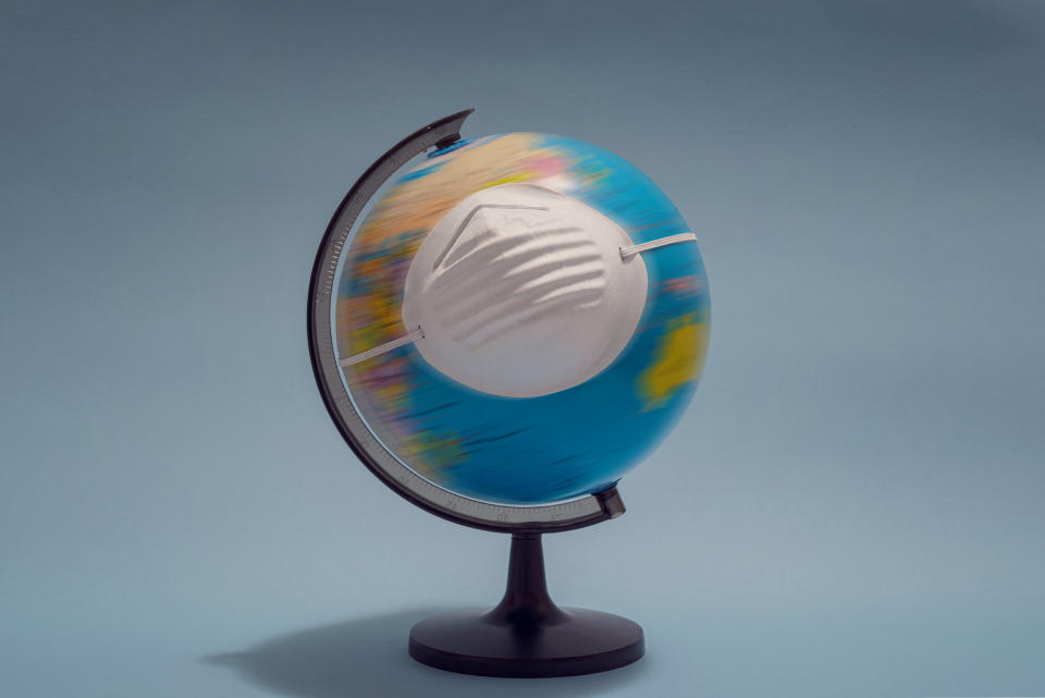 World Globe with protective mask, Global epidemic concept