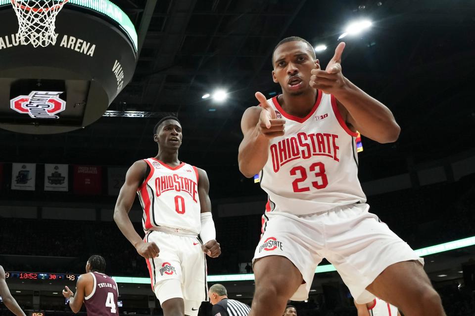 Ohio State forward Zed Key (23) celebrates making a shot with guard Scotty Middleton against Texas A&M on Nov. 10.