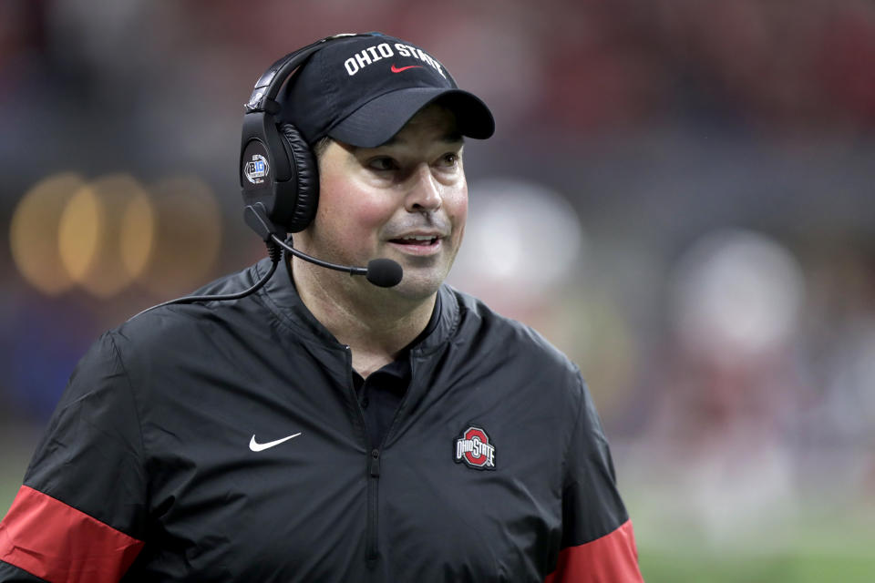 FILE - In this Dec. 7, 2019, file photo, Ohio State coach Ryan Day watches during the second half of the team's Big Ten championship NCAA college football game against Wisconsin in Indianapolis. Ohio State opens preseason training camp on Thursday, Aug. 6, 2020, with strict coronavirus protocols in place and under a cloud of uncertainty about whether a revised 10-game season will even be played at all. (AP Photo/Michael Conroy, File)