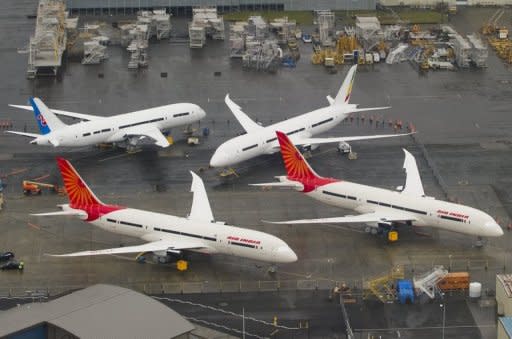 In-production Boeing 787 Dreamliner aircraft for Air India and other airlines sit on the tarmac at the Boeing production facilities at Paine Field in Everett, Washington. Boeing said around 55 of its flagship 787 Dreamliners "have the potential" to develop a fuselage shimming problem, but reiterated that the fault was being fixed