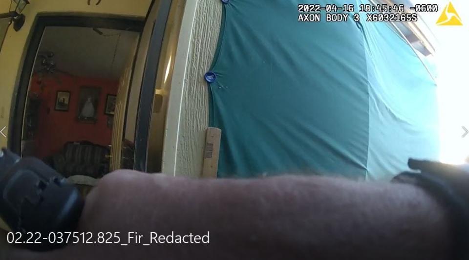 A still image from the body camera of a Las Cruces police officer seconds after he killed Amelia Baca in her home on April 16, 2022.
