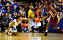 DURHAM, NC - JANUARY 21: Tyler Thornton #3 of the Duke Blue Devils battles Okaro White #10 of the Florida State Seminoles for a loose ball during play at Cameron Indoor Stadium on January 21, 2012 in Durham, North Carolina. (Photo by Grant Halverson/Getty Images)
