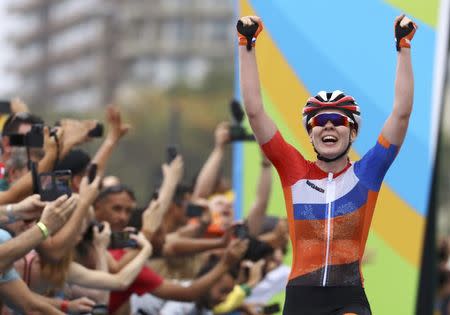 2016 Rio Olympics - Cycling Road - Final - Women's Road Race - Fort Copacabana - Rio de Janeiro, Brazil - 07/08/2016. Anna van der Breggen (NED) of Netherlands celebrates at the end of the race. REUTERS/Paul Hanna