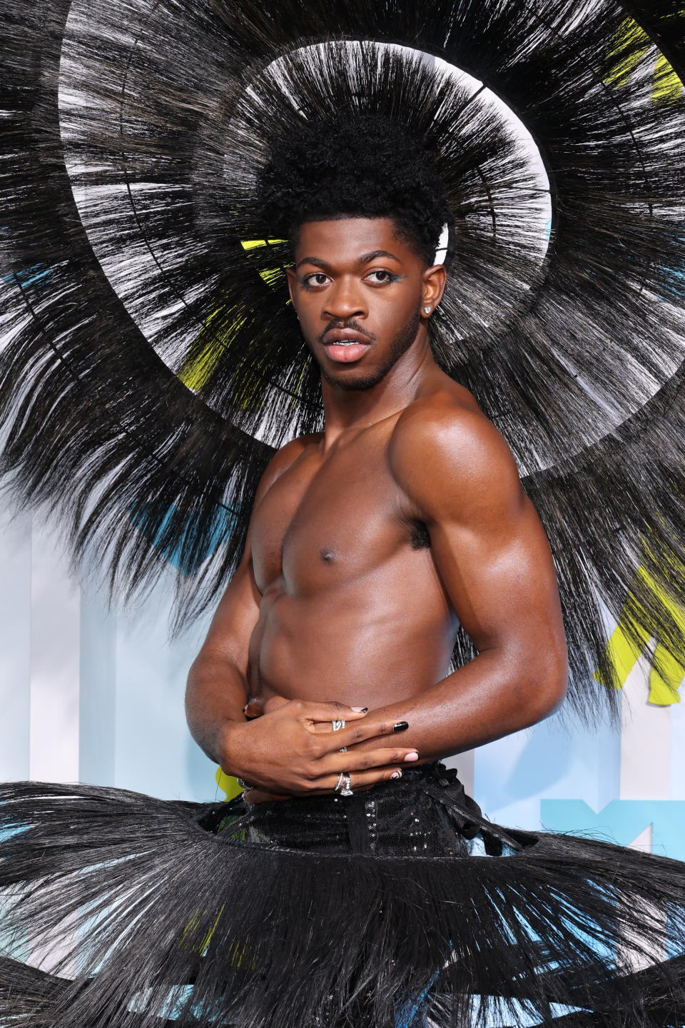 To achieve Lil Nas X's fabulous look at last night's show, celebrity hairstylist Coree Moreno used götb Metallics Permanent Hair Color in Blue Charcoal in the 