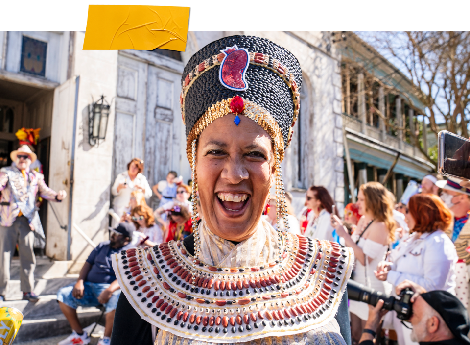 Singer Margie Perez participates in the Krewe of Red Beans parade on February 28, 2022 in New Orleans, Louisiana. The krewe uses beans to decorate homemade costumes for its second-line style walking parades. 2021 Mardi Gras activities were cancelled in an effort to prevent the spread of COVID-19. (Erika Goldring / Getty Images)