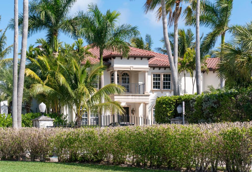 View of lakefront home purchased recently by Guy Fieri, Thursday in Lake Worth Beach.