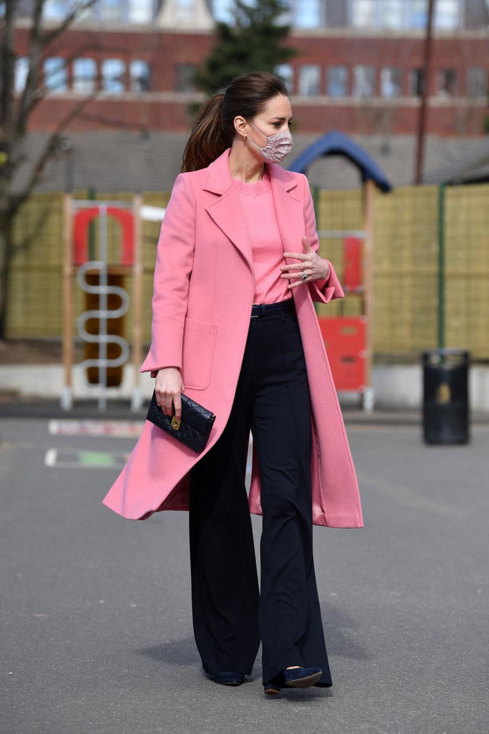 The Duchess of Cambridge wore a pink Boden jumper when she visited School21 following its re-opening after the easing of coronavirus lockdown restrictions on 11 March. (Getty Images)