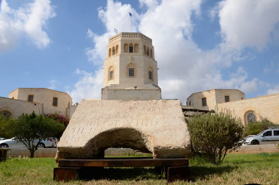 The monumental inscription, photographed in front of the Rockefeller Museum in Israel.