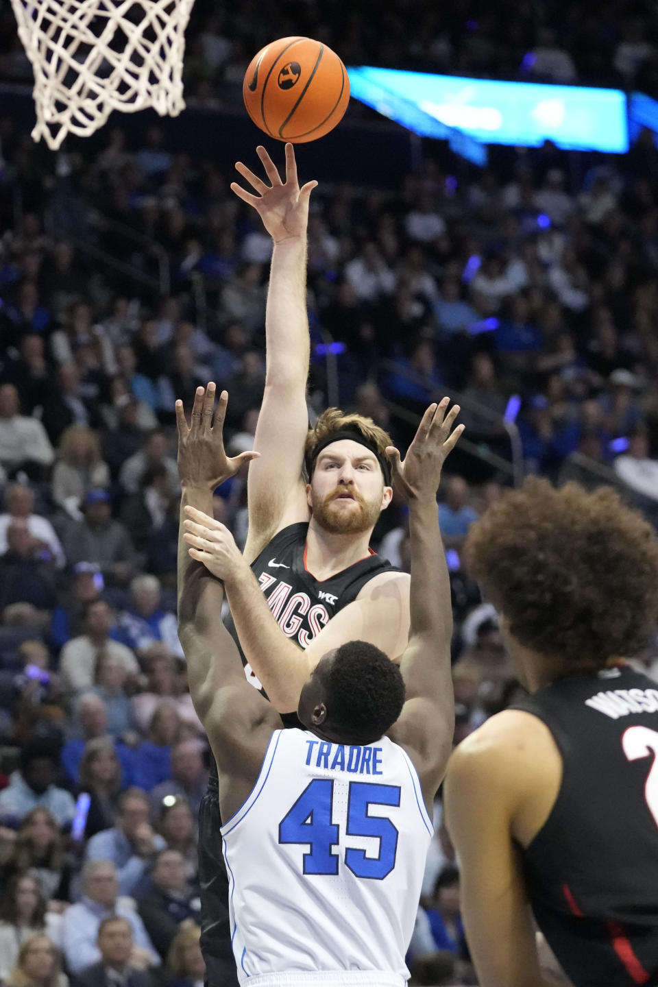 Gonzaga forward Drew Timme shoots as BYU forward Fousseyni Traore (45) defends during the first half of an NCAA college basketball game Thursday, Jan. 12, 2023, in Provo, Utah. (AP Photo/Rick Bowmer)