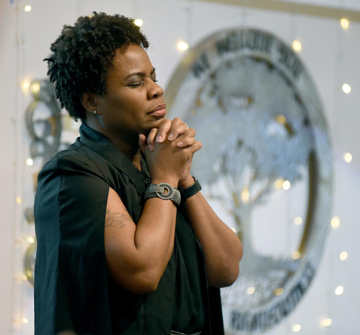 Pastor Heather Boone of Oaks of Righteousness Christian Church in Monroe prays before giving her sermon 'Faith Comes By Hearing' on March 17, 2024.