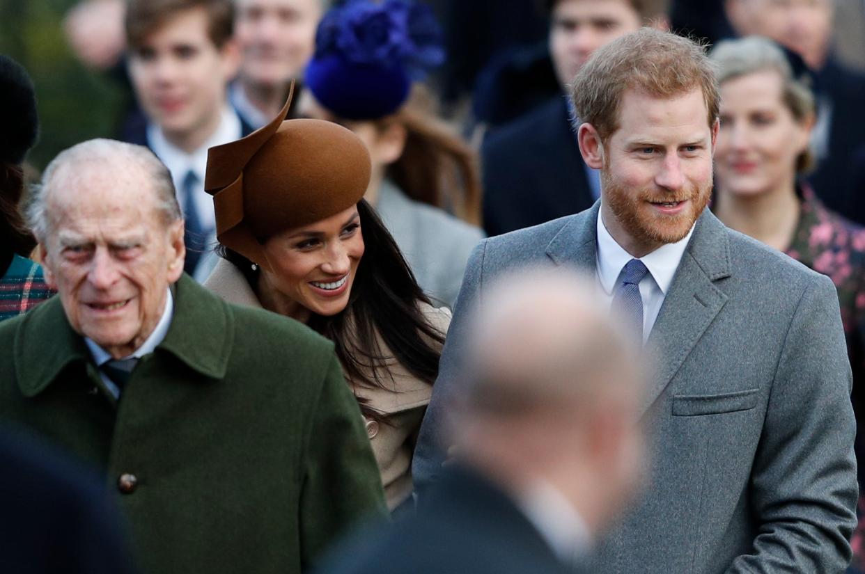 Prince Philip, Duke of Edinburgh, US actress and fiancee of Britain's Prince Harry Meghan Markle and Britain's Prince Harry (R) arrive to attend the Royal Family's traditional Christmas Day church service at St Mary Magdalene Church in Sandringham, Norfolk, eastern England, on December 25, 2017 (AFP via Getty Images)