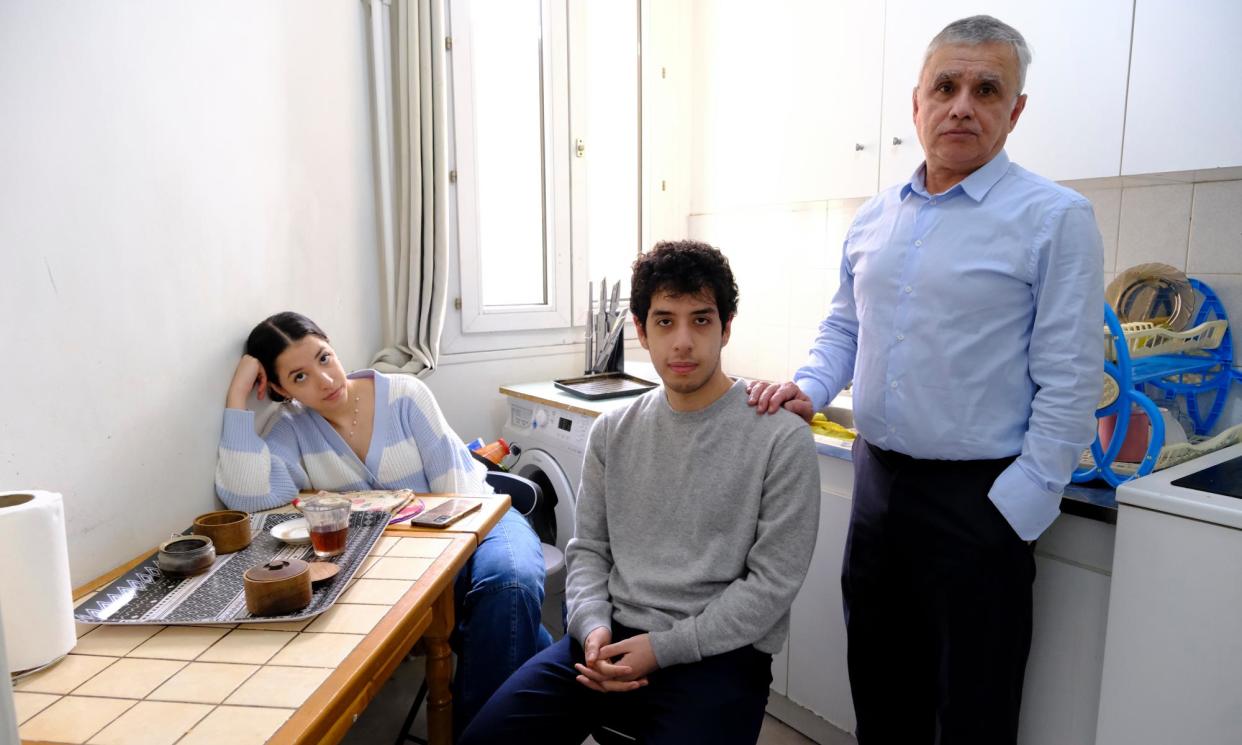 <span>Ali and Kiana Rahmani, children of Narges Mohammadi, Iranian journalist, human rights campaigner and Nobel peace prize-winner, with their father, political activist Taghi Rahmani, at home in Paris.</span><span>Photograph: Isabelle Eshraghi/Agence VU/The Guardian</span>