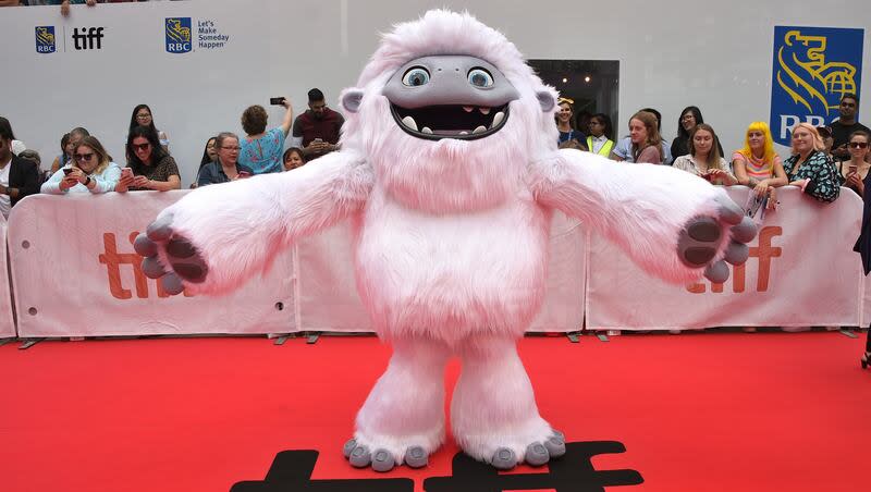 In this Sept. 7, 2019, file photo, the character Everest from the film "Abominable" appears on the red carpet on day three of the Toronto International Film Festival at Roy Thomson Hall in Toronto.