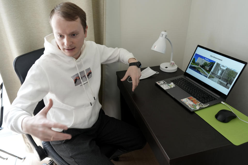 Ukrainian Dmytro Remez speaks during an interview with the Associated Press, at his dormitory room in Tokyo, on Feb. 15, 2023. Remez, 24, a fledgling medical doctor studying at Juntendo University, is among the 2,291 Ukrainians who have moved to Japan since the war with Russia began a year ago. (AP Photo/Shuji Kajiyama)