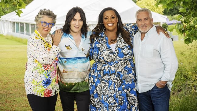 The Great British Bake Off hosts and judges - Prue, Noel, Alison and Paul standing in front of a white tent