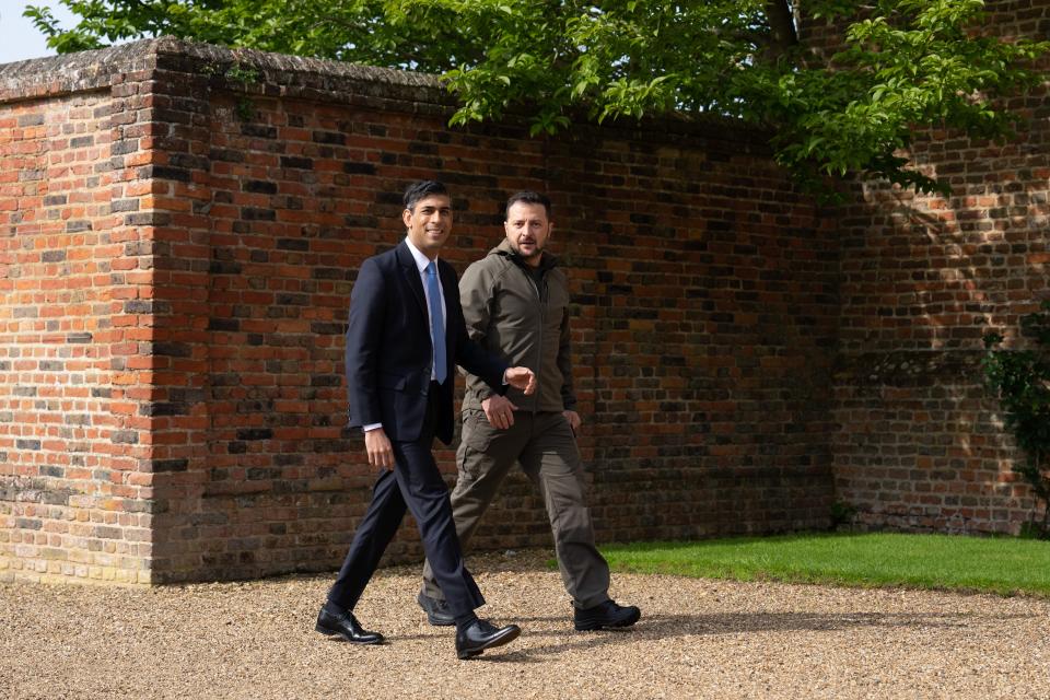 Prime minister Rishi Sunak walks with Ukraine’s president Volodymyr Zelensky after greeting him on his arrival at Chequers (Getty Images)