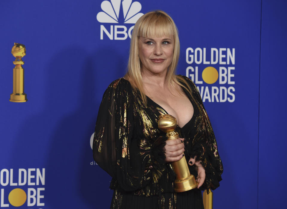 Patricia Arquette poses in the press room with the award for best performance by an actress in a supporting role in a series, limited series or motion picture made for television for "The Act" at the 77th annual Golden Globe Awards at the Beverly Hilton Hotel on Sunday, Jan. 5, 2020, in Beverly Hills, Calif. (AP Photo/Chris Pizzello)