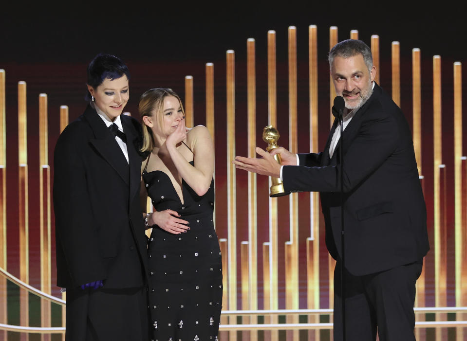 This image released by NBC shows Emma D'Arcy, from left, Milly Alcock, and Miguel Sapochnik accepting the award for Best Television Series – Drama for "House of the Dragon" during the 80th Annual Golden Globe Awards at the Beverly Hilton Hotel on Tuesday, Jan. 10, 2023, in Beverly Hills, Calif. (Rich Polk/NBC via AP)