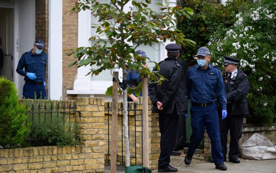A police search team leaving the reported residence of Ali Harbi Ali, who is a suspect in the murder of David Amess - Leon Neal/Getty Images