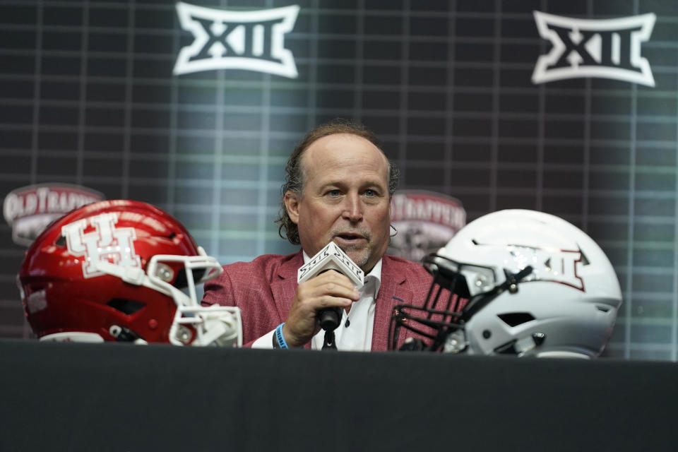 Houston's head football coach Dana Holgorsen speaks at the NCAA college football Big 12 media days in Arlington, Texas, Wednesday, July 12, 2023. (AP Photo/LM Otero)