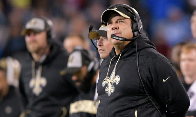 A closeup of New Orleans Saints coach Sean Payton wearing a black visor.