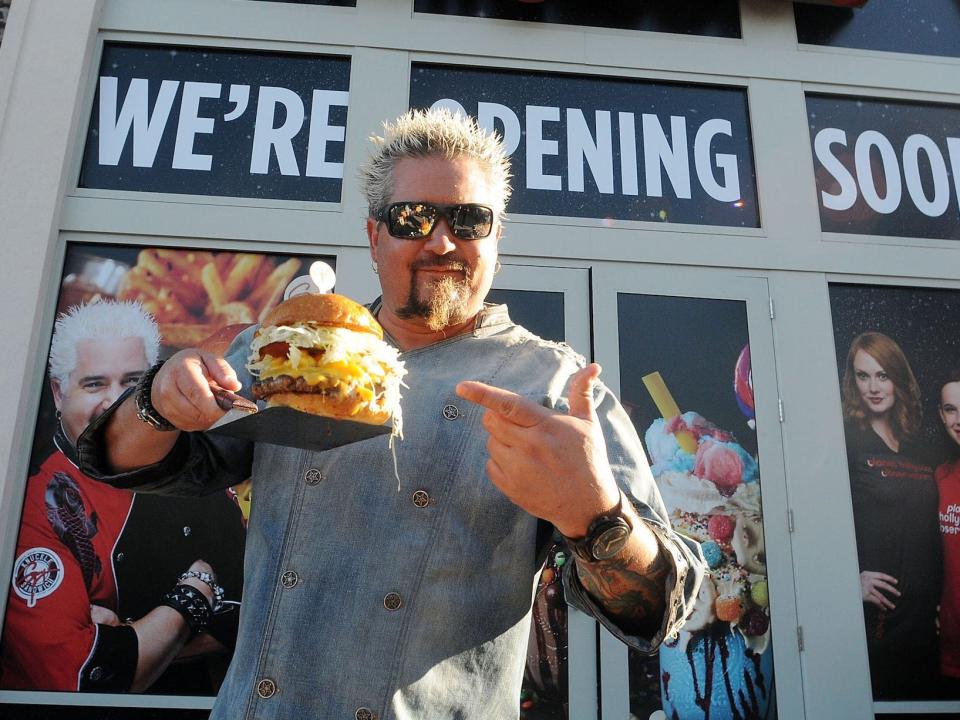 Guy Fieri with burger