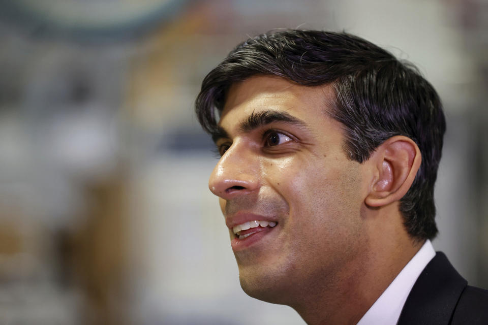 Britain's Chancellor of the Exchequer Rishi Sunak visits the Worcester Bosch factory to promote the initiative, Plan for Jobs, in Worcester, England, Thursday July 9, 2020. (Phil Noble/Pool via AP)