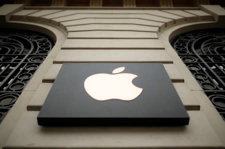 The logo of Apple company is seen outside an Apple store in Paris