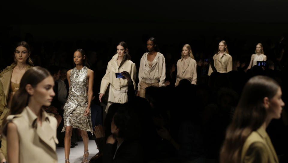 Models wears creations for Salvatore Ferragamo women's Spring-Summer 2014 collection, part of the Milan Fashion Week, unveiled in Milan, Italy, Sunday, Sept. 22, 2013. (AP Photo/Luca Bruno)