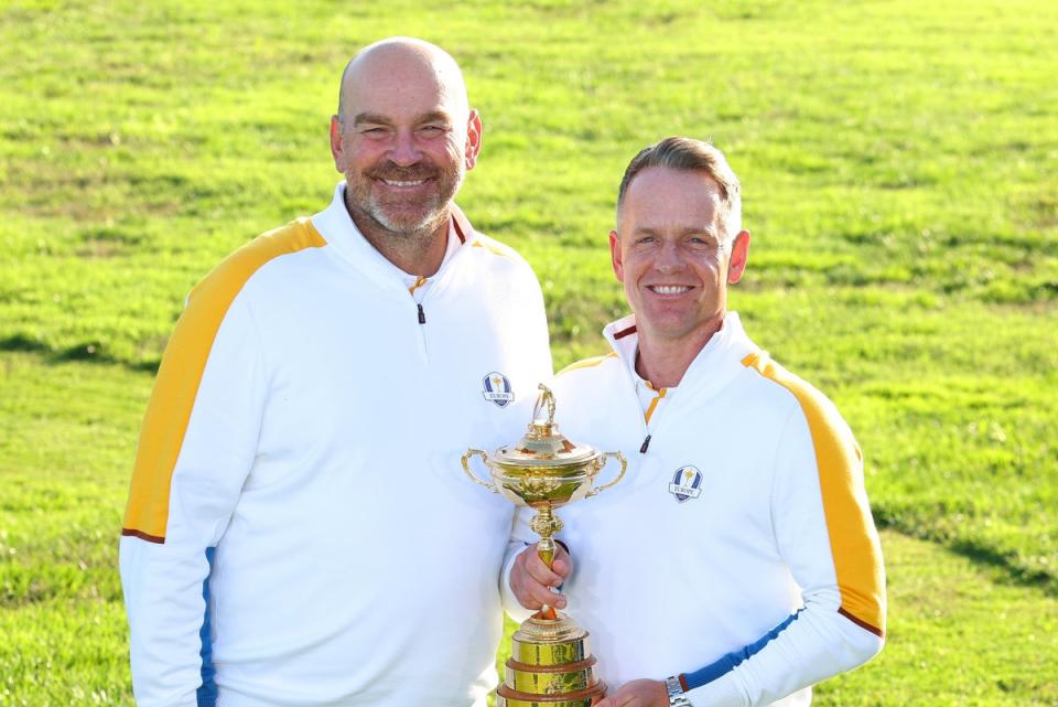 Vice-captain Thomas Bjorn and captain Luke Donald pose with the Ryder Cup trophy ahead of the tournament in Rome  (Getty)