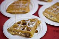 Bacon waffles from Elly's Pancake House are drizzled with maple syrup.<br> <br> <a href="http://www.flickr.com/photos/opacity/" rel="nofollow noopener" target="_blank" data-ylk="slk:Image courtesy Anne Petersen.;elm:context_link;itc:0;sec:content-canvas" class="link ">Image courtesy Anne Petersen.</a>