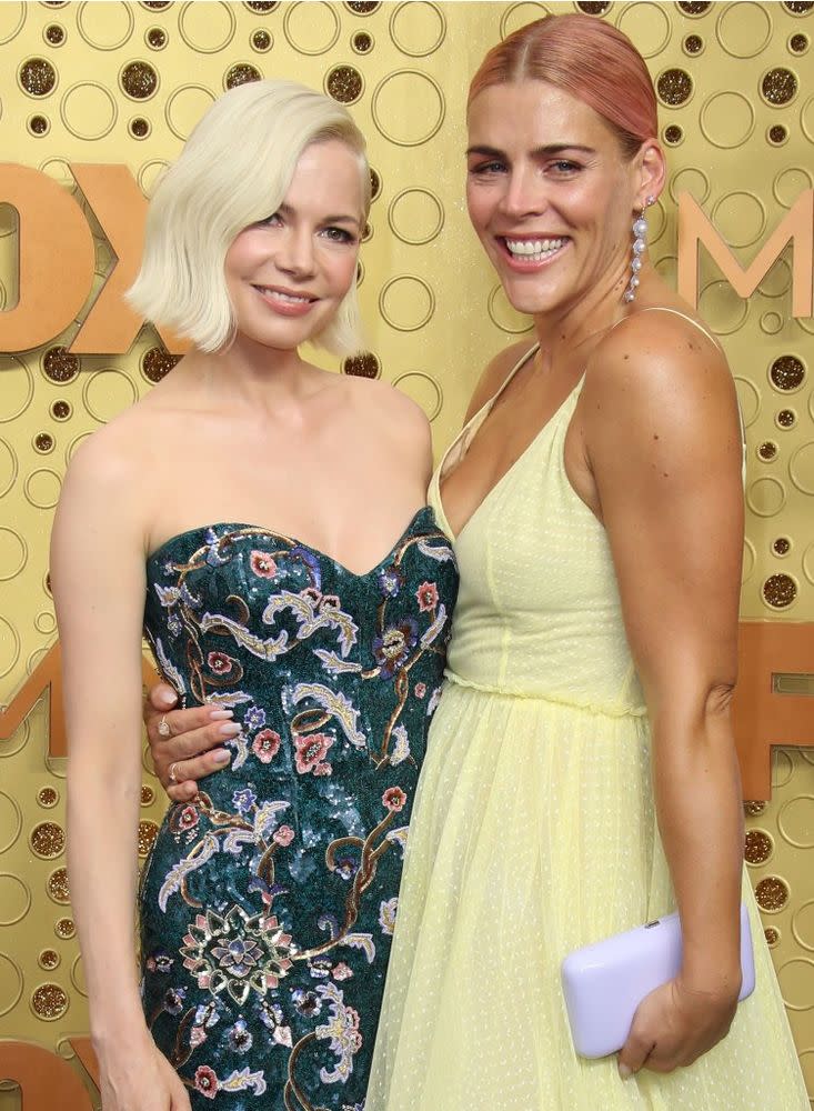 Michelle Williams and Busy Philipps | Dan MacMedan/WireImage