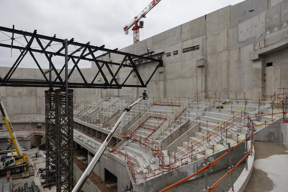 FILE - The Paris2024 Olympics Porte de la Chapelle Arena building site is pictured Monday, Jan. 23, 2023 in Paris. Paris authorities are trying to clear out crack users from a long-blighted neighborhood near a new venue built for the Paris 2024 Olympics, with mixed effects. (AP Photo/Lewis Joly, File)