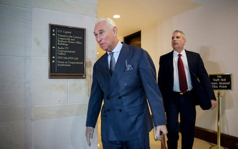 Longtime Donald Trump associate Roger Stone arrives to testify before the House Intelligence Committee, on Capitol Hill in Washington in September 2017 - Credit: AP