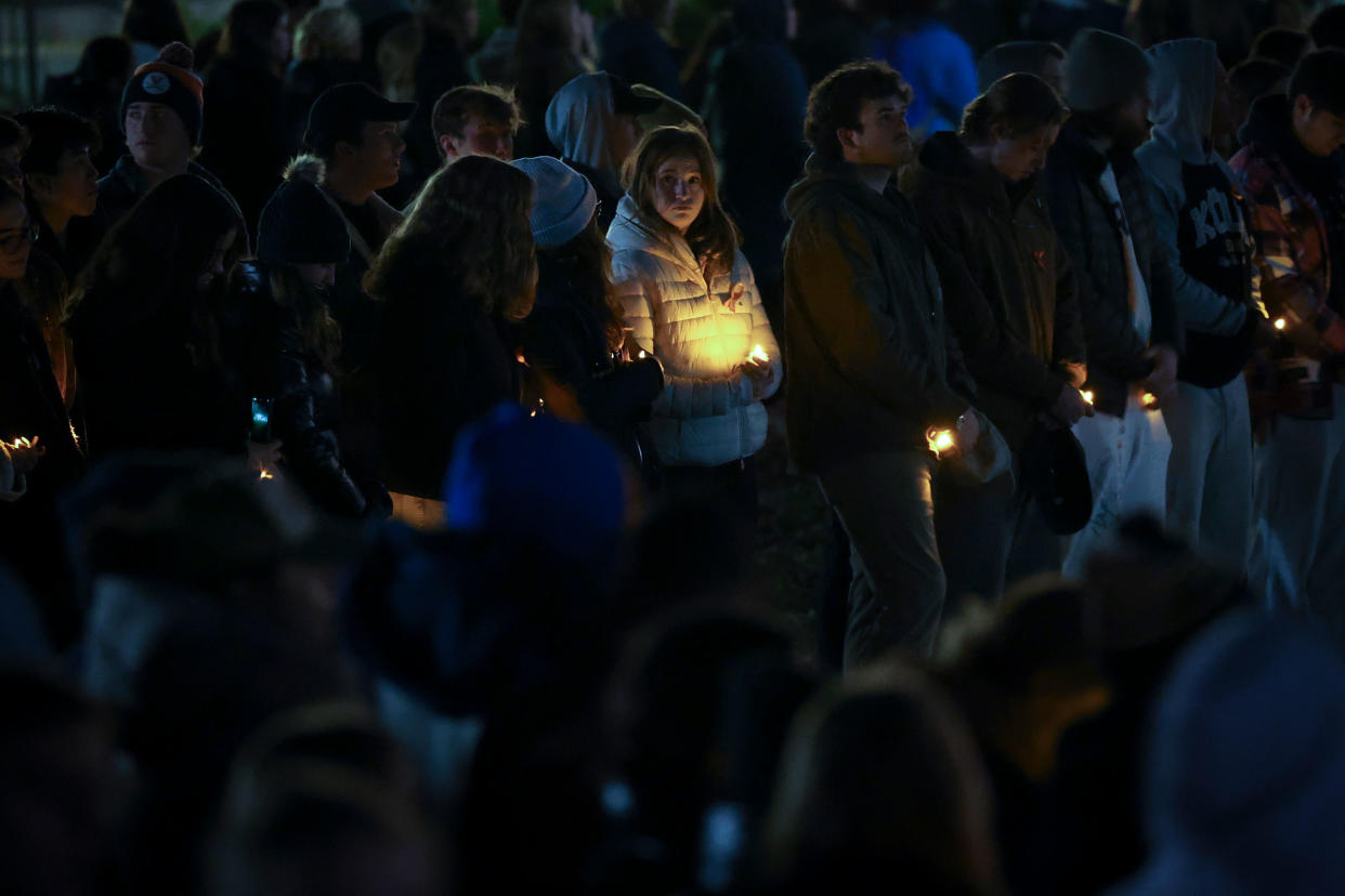 Members of the University of Virginia community attend a candlelight vigil on the South Lawn for the victims of a shooting overnight at the university, on Nov. 14, 2022, in Charlottesville, Va.