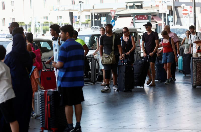 FILE PHOTO: Tourist deluge, heatwave lay bare Italy's taxi shortage