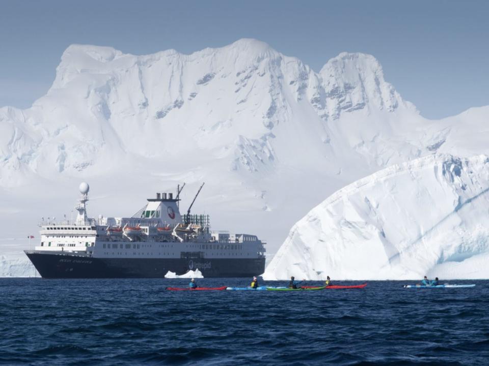 The kayakers paddling around Neko Harbour in Antarctica.