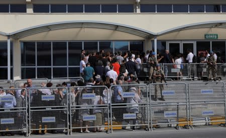 Friends and supporters of the defendants line up to enter the courtroom at the Silivri Prison and Courthouse complex in Silivri near Istanbul