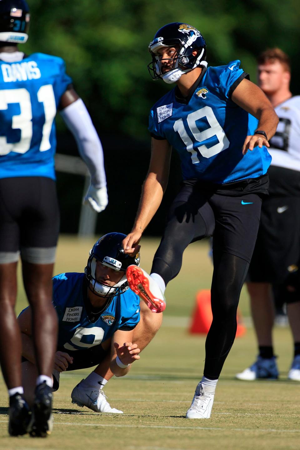 Jaguars kicker Ryan Santoso (19) is in a battle with Elliott Fry for the starting job.