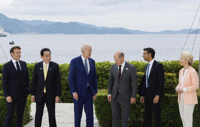 From left, France's President Emmanuel Macron, Japan's Prime Minister Fumio Kishida, U.S. President Joe Biden, Germany's Chancellor Olaf Scholz, Britain's Prime Minister Rishi Sunak and European Commission President Ursula von der Leyen participate in a family photo with G7 leaders before their working lunch meeting on economic security during the G7 summit, at the Grand Prince Hotel in Hiroshima, western Japan Saturday, May 20, 2023. (Jonathan Ernst/Pool Photo via AP)