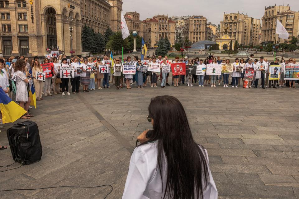 Relatives, friends and members of the public attend a rally in support of Ukrainian prisoners of war and military medics captured during the Russian invasion, at Independence Square in Kyiv on June 18 (Getty Images)