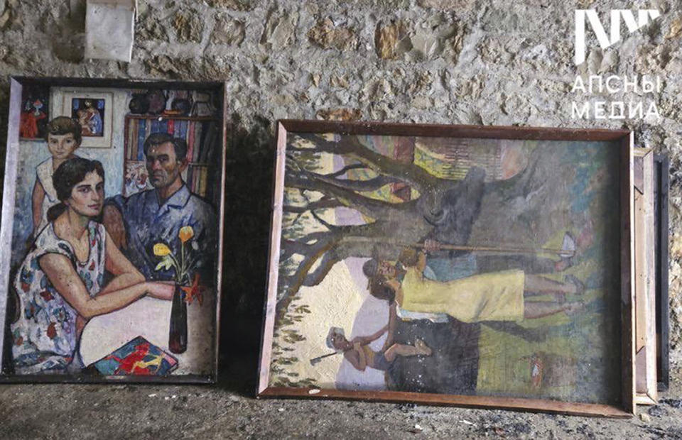 Paintings from the National Art Gallery in Abkhazia are seen outside the National Art Gallery in Abkhazia, in Sukhumi the capital of the separatist Georgian region, Sunday, Jan. 21, 2024. Thousands of artworks have been destroyed in a fire that swept through the main art gallery in Abkhazia in a severe blow to the cultural heritage of the separatist Georgian region. (Apsny Media via AP)