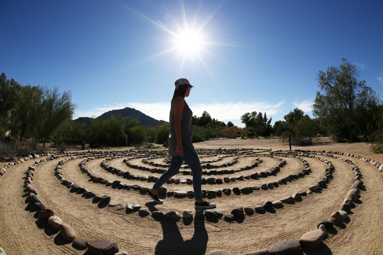 Michelle Spence of Phoenix walks the labyrinth on Oct. 31, 2018 at the Franciscan Renewal Center.