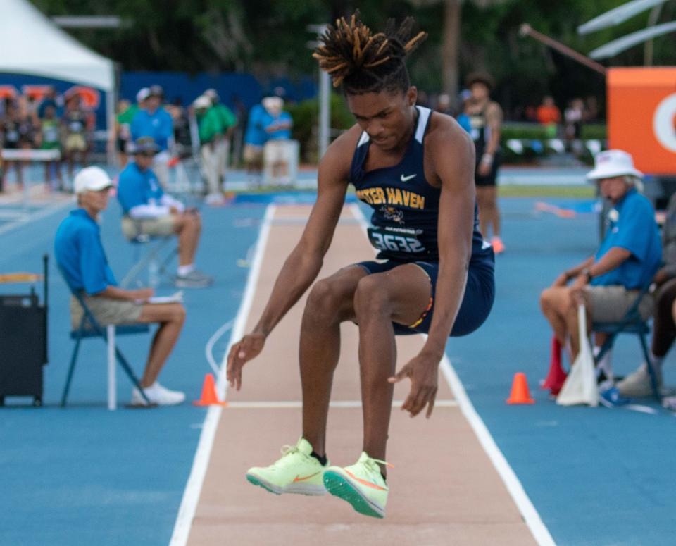 Winter Haven sophomore Jaden Lippett competes in the triple jump at the Class 4A state track meet in Gainesville. He won the triple jump and took third in the long jump.